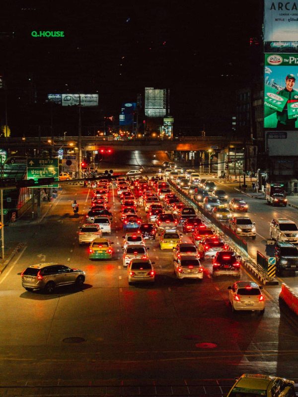 crowded road by cars traffic in the night time